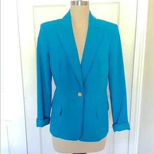 Calvin Klein, 8, turquoise jacket